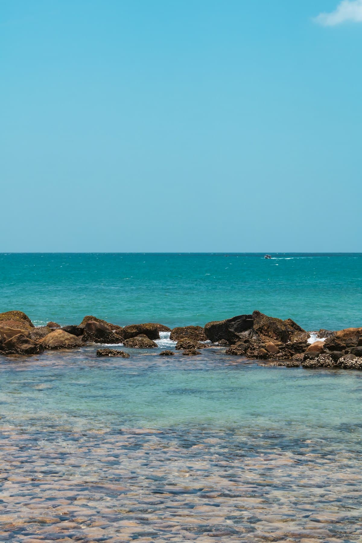 A clear turquoise snorkelling cove at Mirissa Beach on Sri Lanka’s south coast